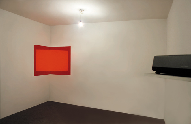 Gunda Forster, RED-LIGHT, slide projection on a red corner, 1995_1